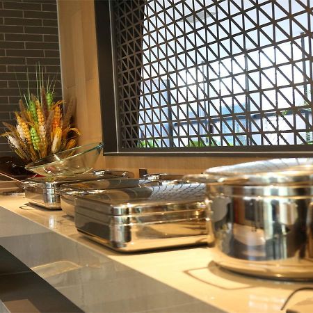 Qiu Guo Hotel Hua Mao Chaoyang  Exterior photo