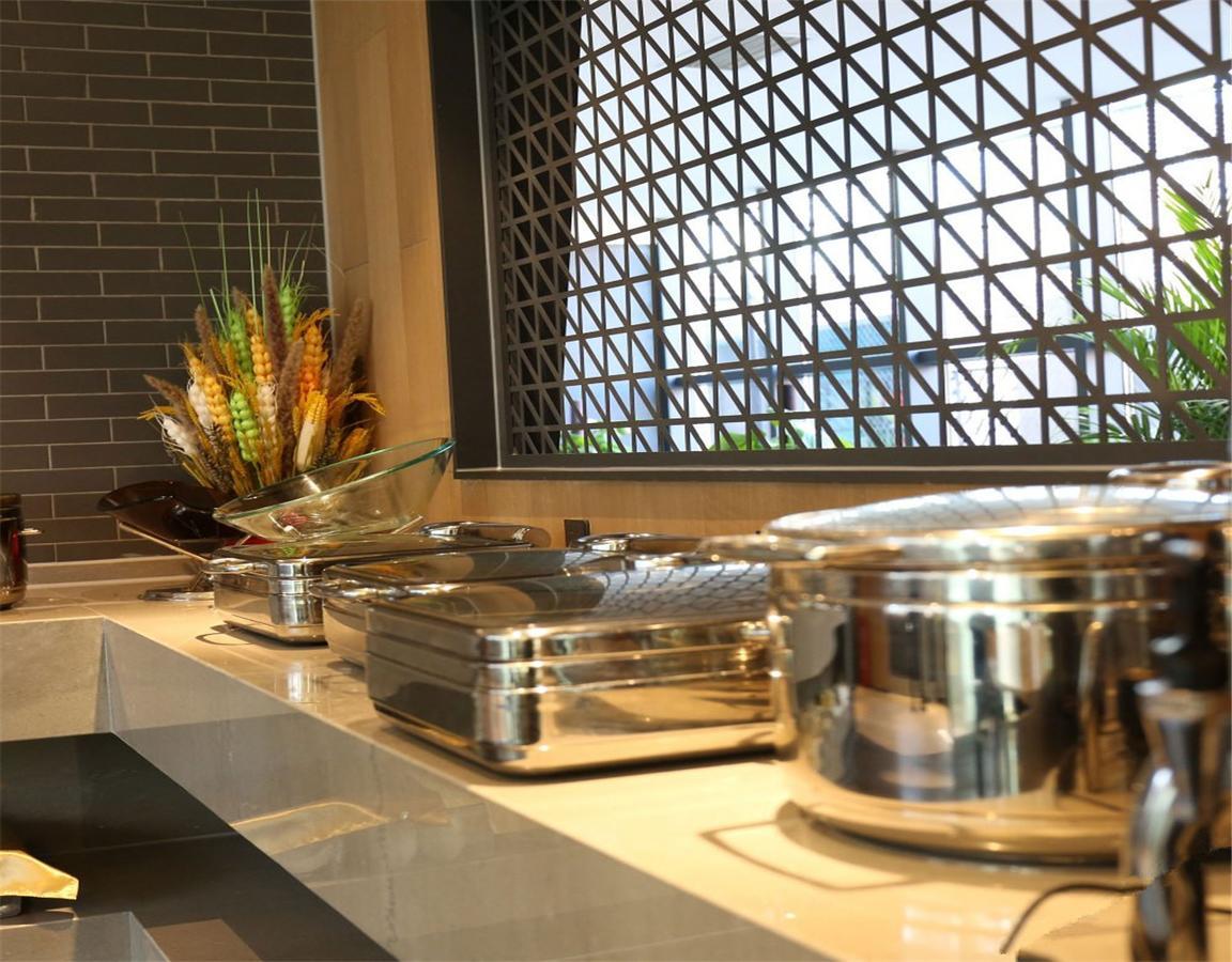 Qiu Guo Hotel Hua Mao Chaoyang  Exterior photo
